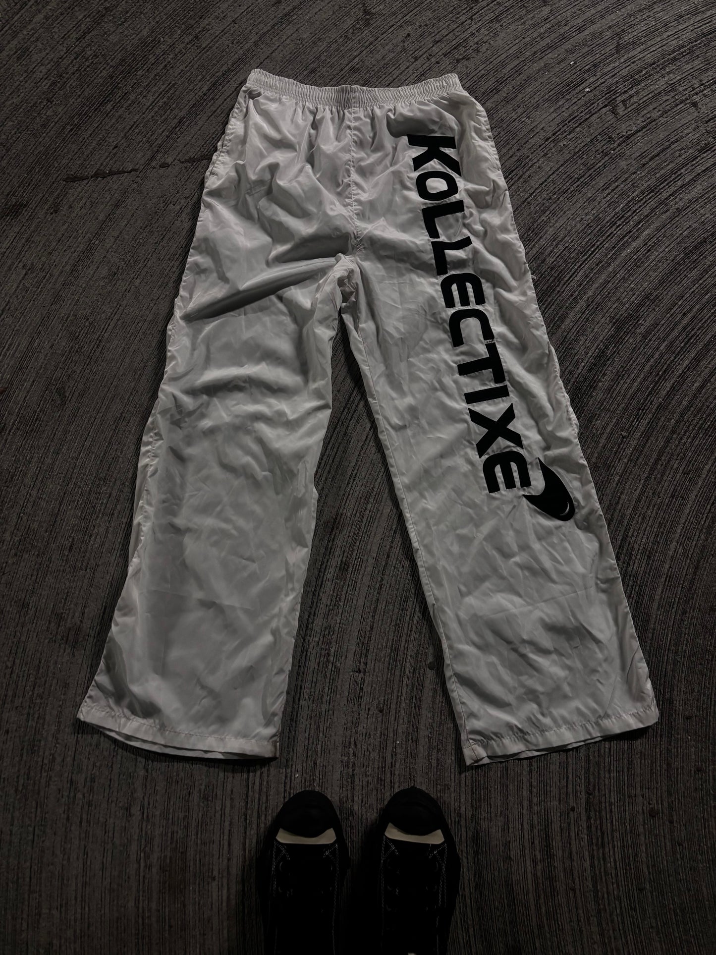 WHITE LOGO TEXT TRACK PANTS