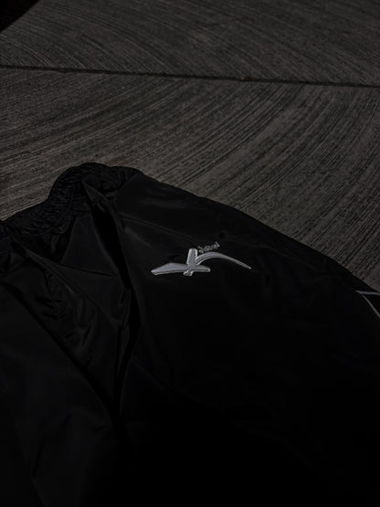 BLACK REFLECTIVE LOGO TEXT TRACK PANTS