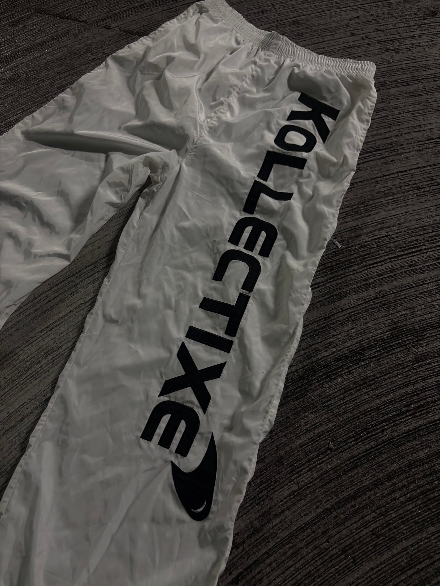 WHITE LOGO TEXT TRACK PANTS