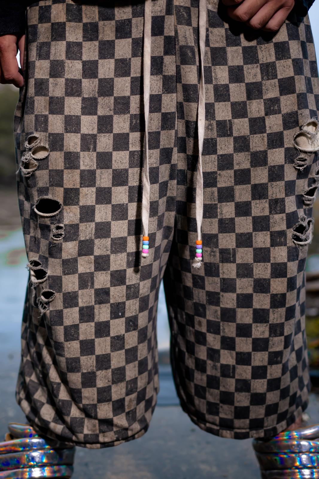 Checkmate 3/4th Shorts — checkerboard weave and distressing, detail